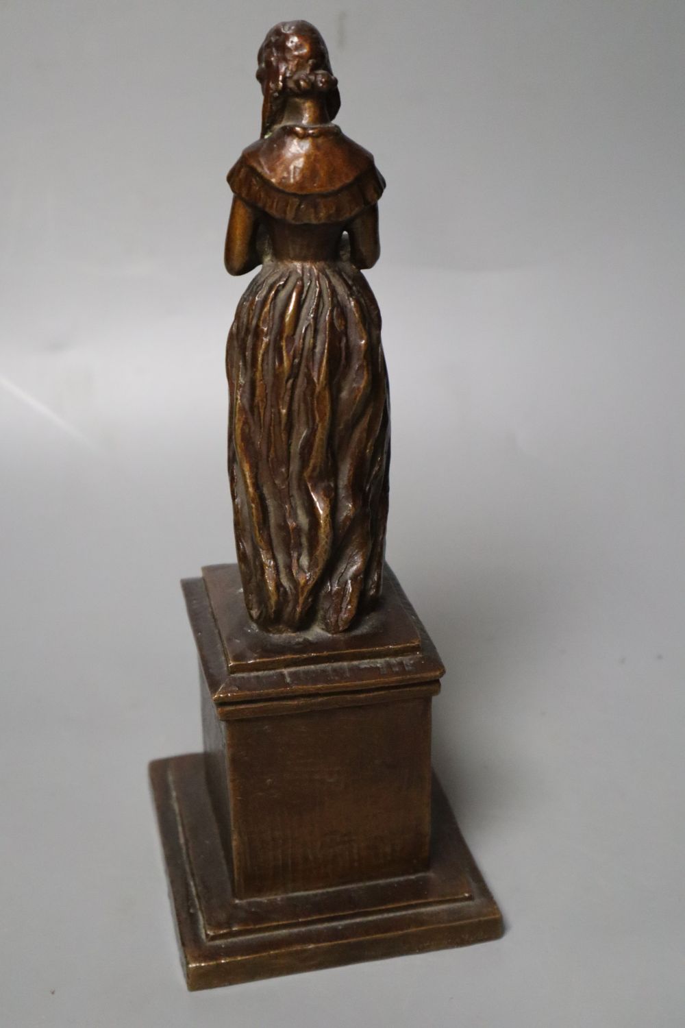 After Herman Bergman. A bronze statuette of Swedish author Frederika Bremer, 24cm